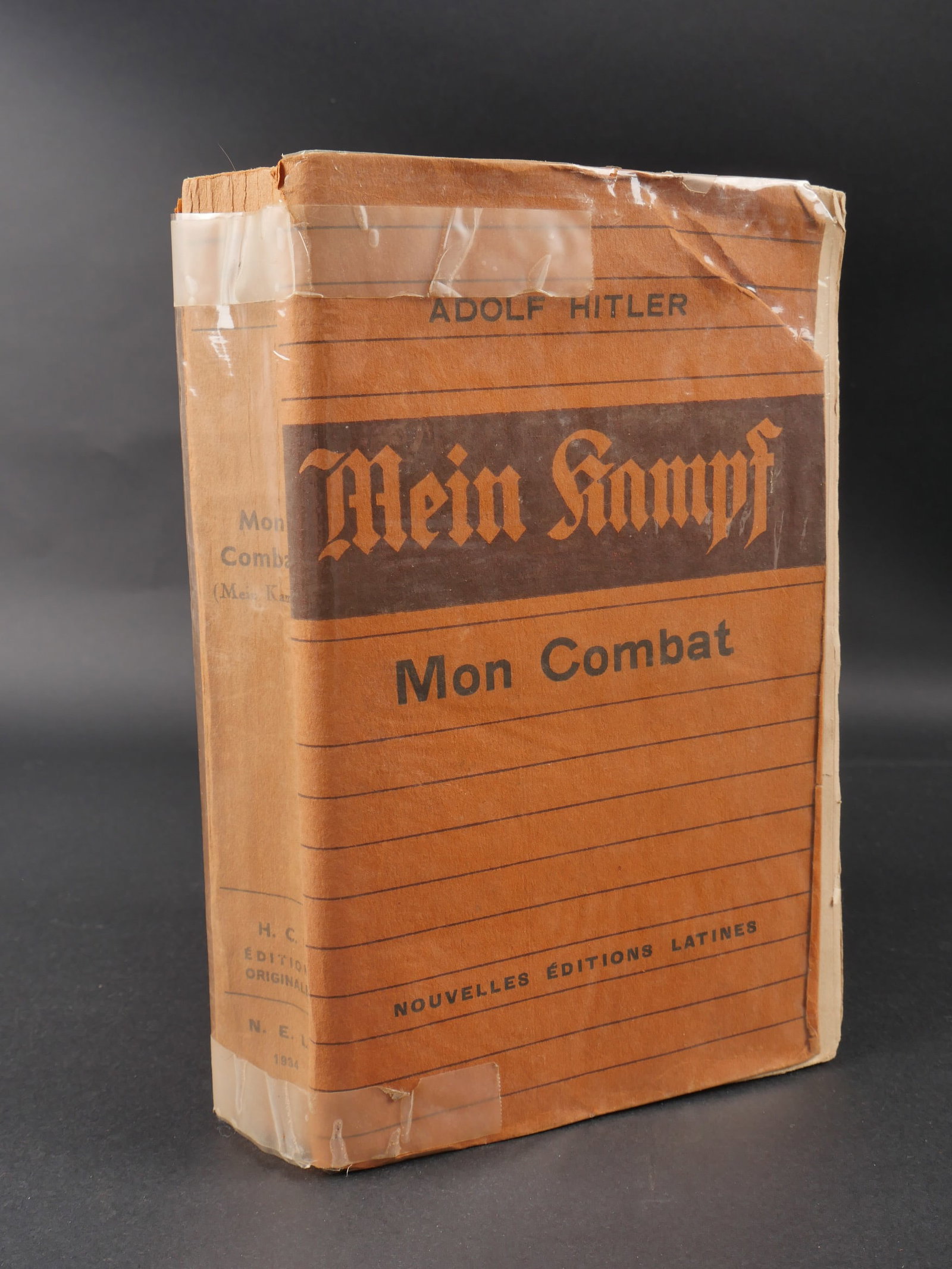 Mein kampf.: Mein Kampf. Modele en francais. Nouvelles editions latines. HC Editions originale. 1934. Couverture recouverte d un papier de protection. Quelques manques au niveau de la tranche. A noter une certaine