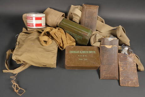 Ensemble d equipement britannique. Set of British equipment: Ensemble d equipements britanniques comprenant quatre pochettes completes, marquees Eyeshield MKIII, un bandoleer britannique, ainsi qu une boite jamais ouverte, marquee Battleship Coffee. Deux