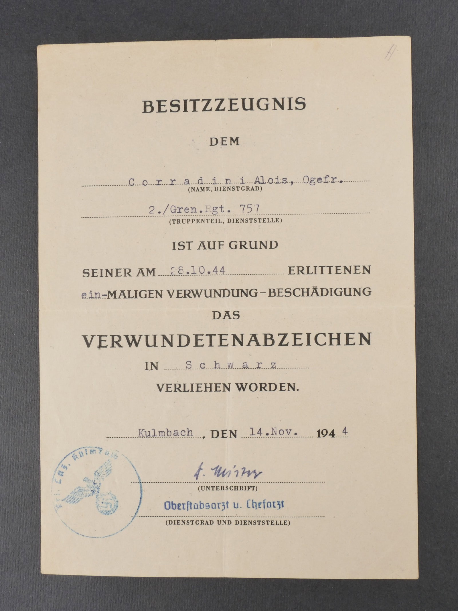 Diplome allemand. German certificates.: Diplome allemand en papier, modele attribue pour la medaille des blesses de guerre en noir. Recipiendaire Corradini Alois, Obergefreiter au 2/Grenadier-Regiment 57. Blessure survenue le 28 octobre 194