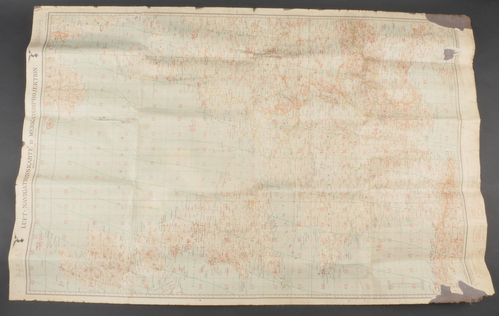 Carte Mercator. Mercator map.: Carte Mercator. En papier et entoilee d origine. Deux aigles de la Luftwaffe du premier type. Marquages Luft Navigationskarte in Merkatorprojektion. Indications nominatives illisibles. Representant l 