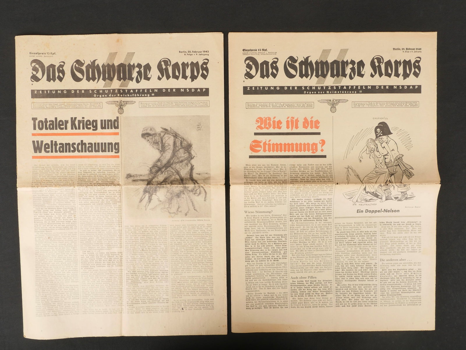 Journaux Das Schwarze Korps. Newspapers Das Schwarze Korps.: Journaux Das Schwarze Korps. Comprenant un exemplaire en date du 29 fevrier 1940 et un autre en date du 25 fevrier 1943. A noter une certaine usure et patine des pieces, ainsi que des pliures et des d
