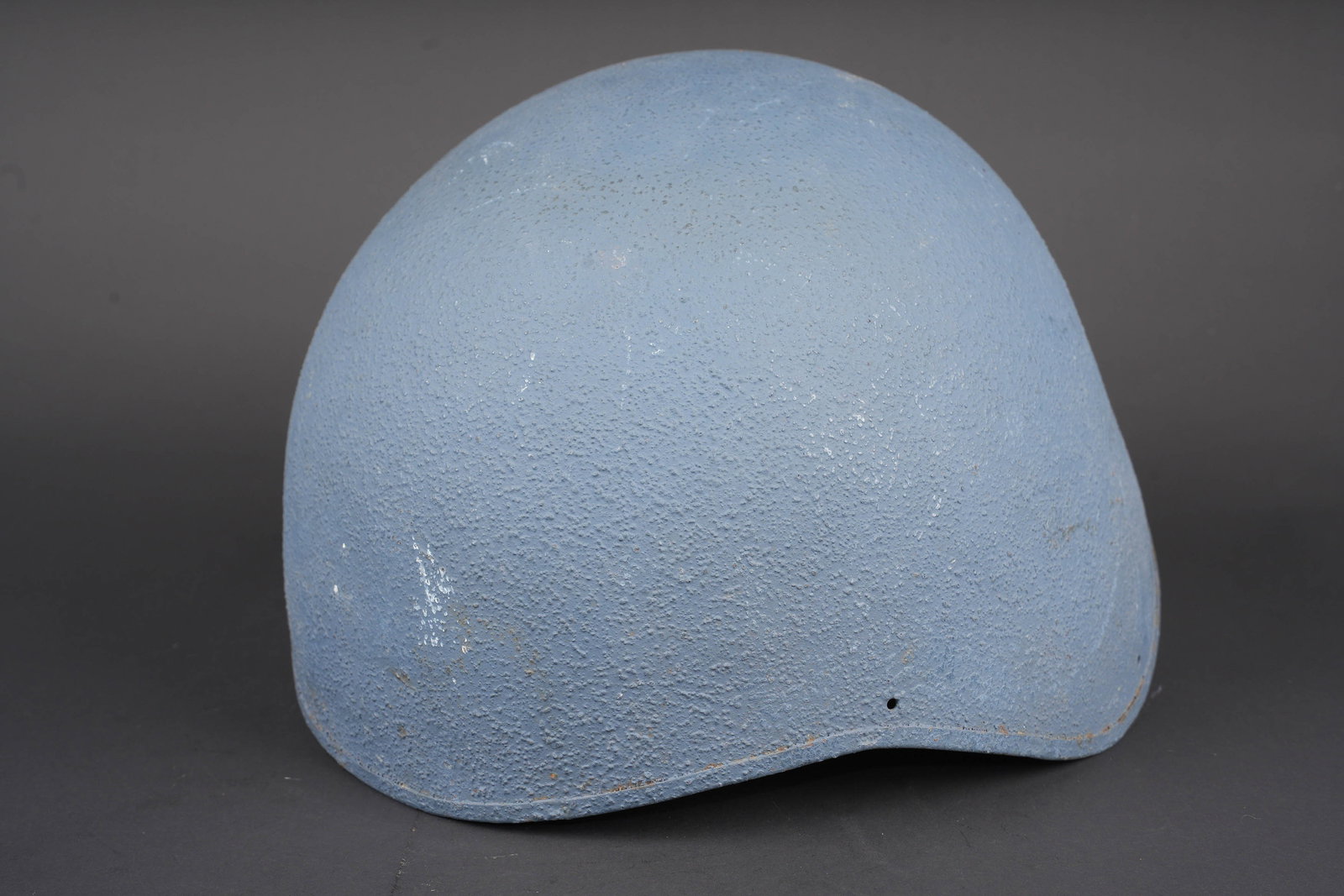 Casque USN MKII. USN Mk II helmet.: Casque USN MK II. Coque de casque en metal. Interieur disposant de sa mousse recouverte dune toile grise. La jugulaire est manquante. Marquages USN MK 2. Peinture et cork a 90%. A noter une certaine u