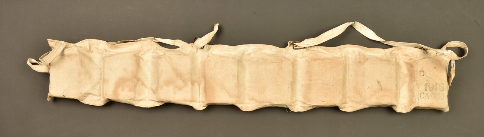 Bouee de l aviso francais Cassini de 1915. Life buoy from the French aviso Cassini dated 1915: Bouee de l aviso francais Cassini de 1915. Flotteurs dans une ceinture de toile blanche, avec ses bretelles et sa sangle d attache. Le Cassini etait un aviso torpilleur entre en service en 1900, affec