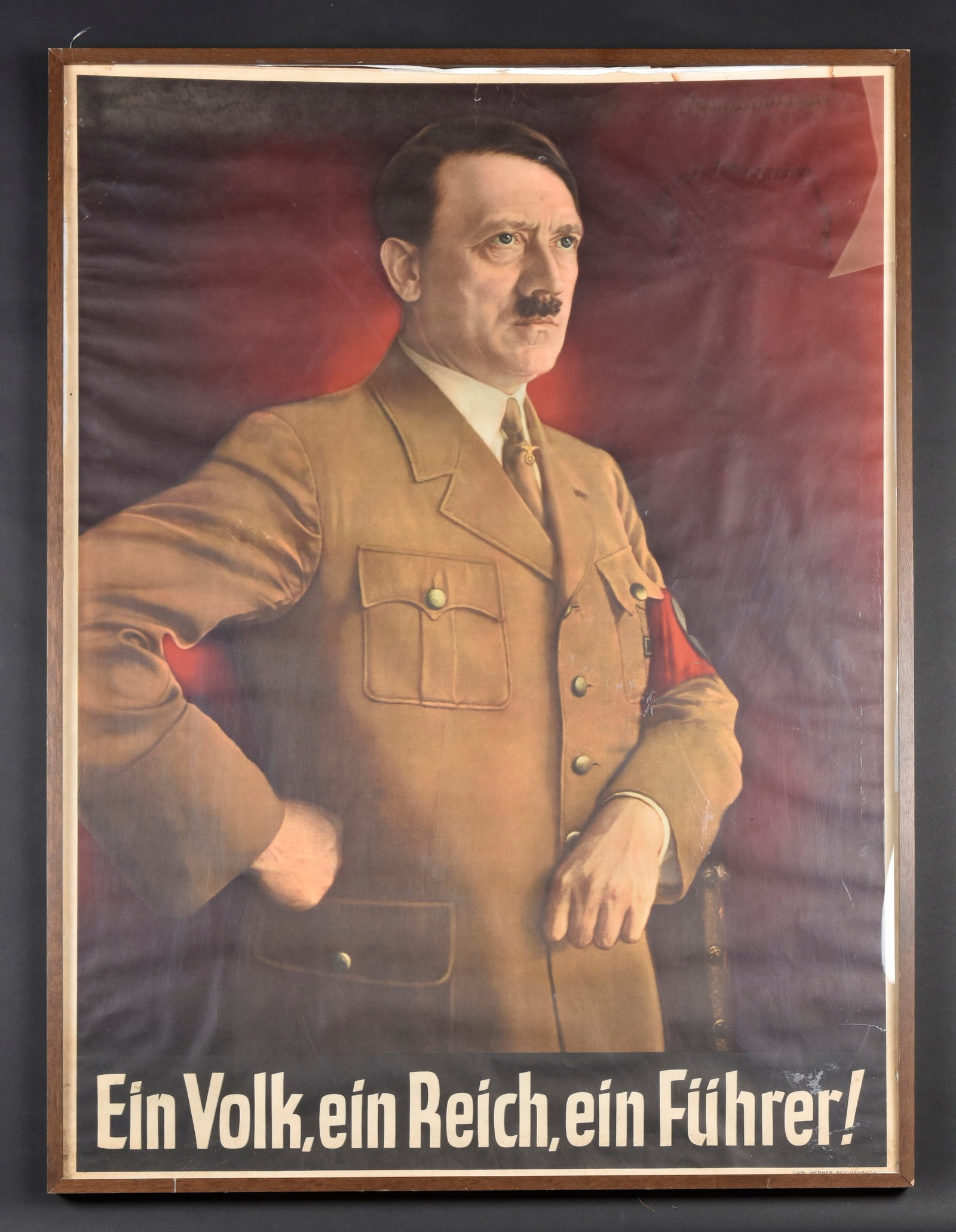Affiche Ein Volk Ein Reich Ein Fuhrer. One People, One Reich, One Fuhrer poster.: Affiche Ein Volk Ein Reich Ein Führer. Grande affiche en couleur representant le Chancelier allemand. En tres bon état. Quelques taches d humidité visible. Marquages Carl Werner Reichenbach. Sous