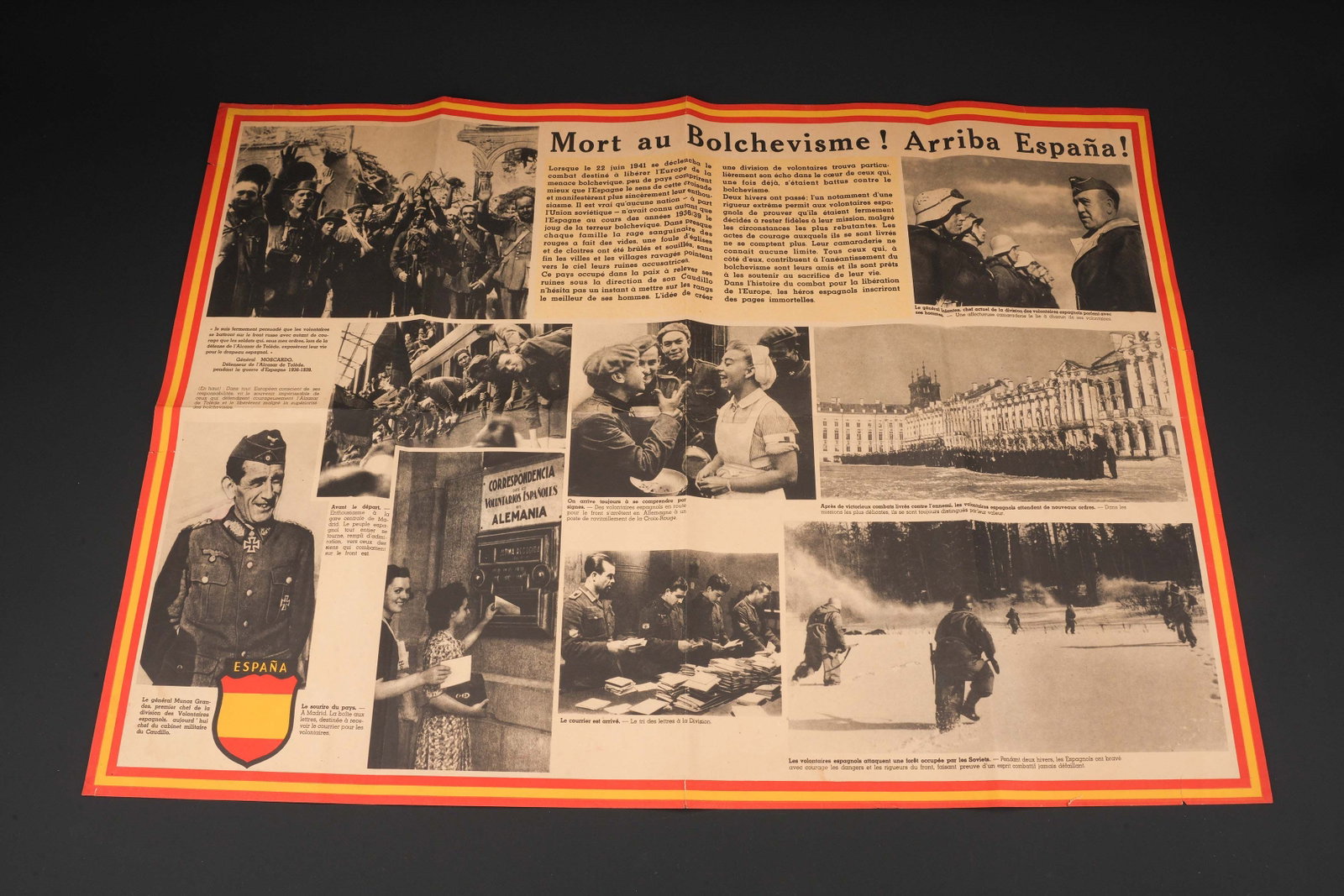 Arriba Espana.: Arriba Espane. Affiche en papier et en couleur. Texte en francais, nombreuses photos noir et blanc. Dimensions 60 x 80 cm. A noter une certaine usure et patine de la piece, ainsi que quelques taches,