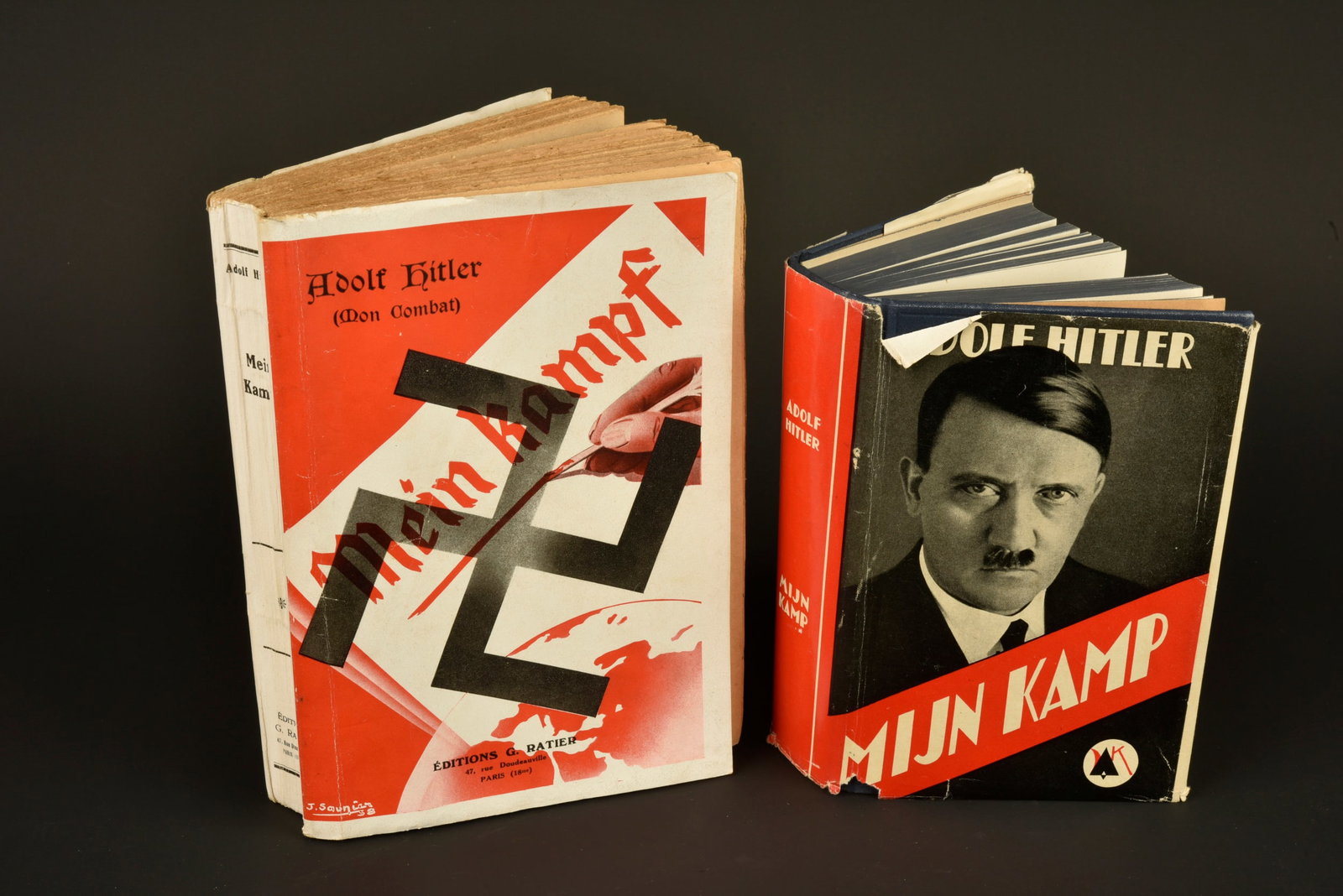 Mein kampf.: Mein Kampf. Comprenant un livre Mein Kampf en francais, editions G Ratier, en francais. Date 939. Un Mein Kampf en flamand, jaquette complete. A noter une certaine usure et patine des pieces. Etat