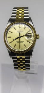 18k Rolex DateJust two tone watch. Ref 15053: A beautiful vintage Rolex two tone 18k/steel date watch in very good condition. Ref 15053. The Champagne Dial and hands are in very good condition. The Jubilee bracelet is in very good,