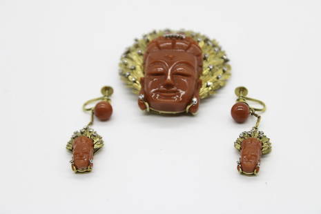 18K Y.G Rhodium Broach & Earring T.A: $ 21,850: ----DETAILS---- ITEM A: One lady's custom and handmade 18kt. yellow gold and rhodium enhanced brooch containing one natural red coral carving of lady buddha gauging 38.50 x 20.70mm. Brooch is also