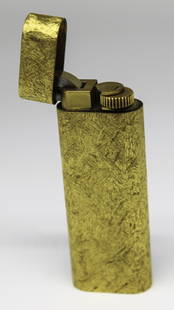 YG Cartier Vintage Lighter: A rare & beauitful Cartier oval gold brushed bark gas lighter. Swiss made, comes with original cartier box Ref. 7430239