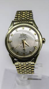 Omega Constellation Men's Watch: ----DESCRIPTION---- A beautiful vintage Omega pie pan Constellation men’s wristwatch. Circa 1950’s -1960’s. Silver dial. Automatic movement, gold tone casing. Power reserve of