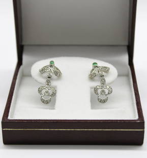 14K White Gold Drop Earrings Diamond/Emerald: ----DESCRIPTION---- A beautiful pair of 14K White Gold Drop Earrings centered with a two emeralds diamond clustered set. -----DETAIL----- WEIGHT// 4.2 SET// Diamond Cluster METAL//14k White Gold