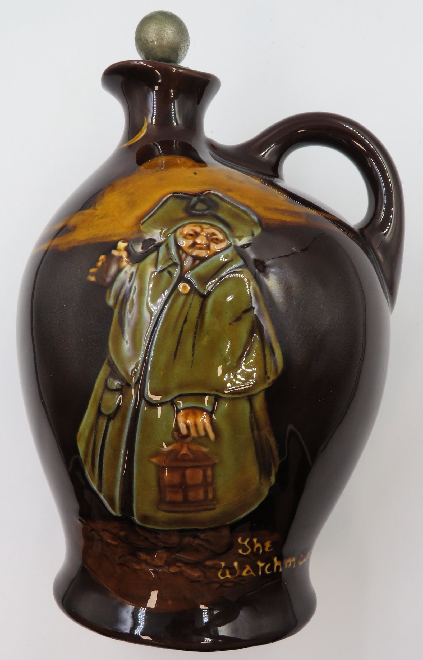 Antique Royal Doulton Kingsway Dewars Whisky Jug: Titled "The Watchman" Circa 1905. Royal Doultons handpainted promotional barware & alchohol advertising pieces are amongst the most sought after collectibles by Doulton. Size 8.5"x5"x4" Undergalze mar
