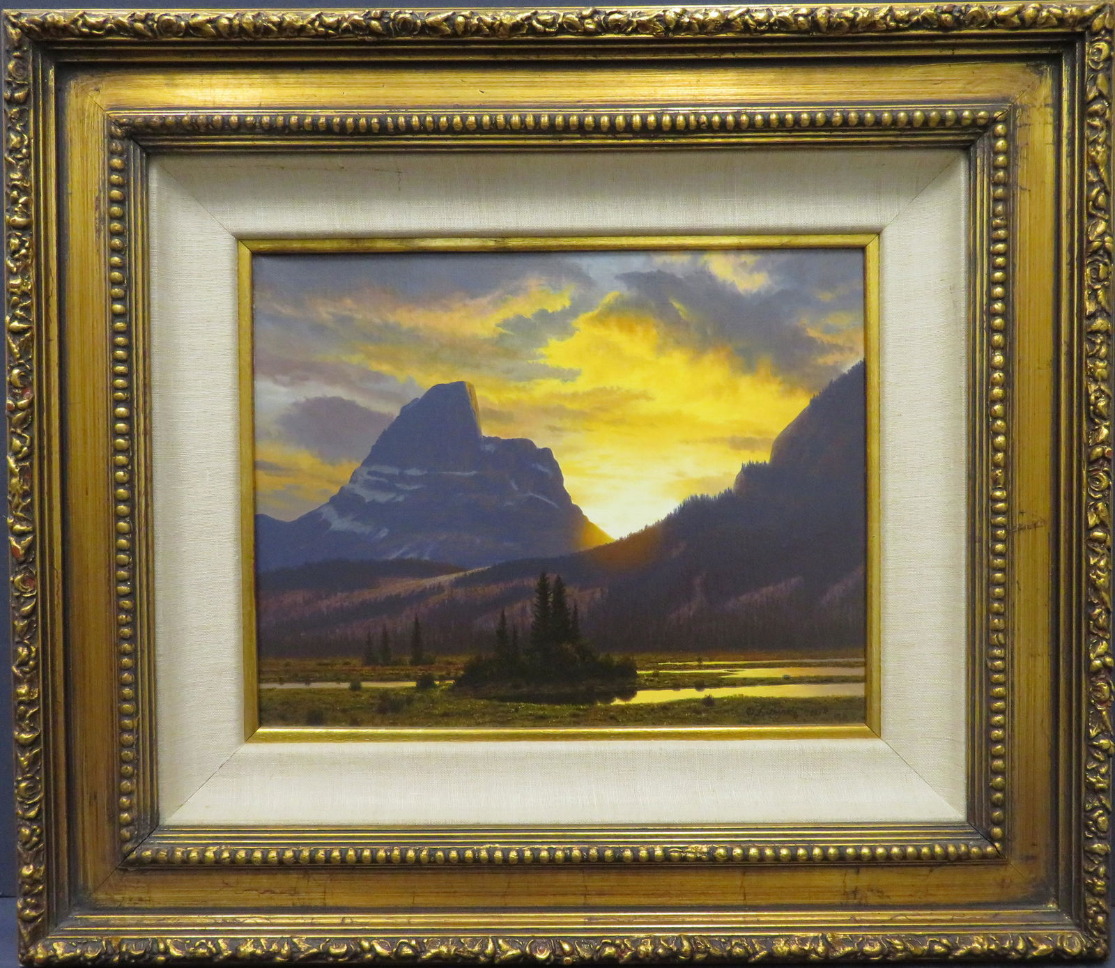 James Fetherolf (American 1925-1994): Oil on canvas showing a beautifully detailed mountainous landscape study titled "Canadian Sunset, Roche Miette, Jasper National Park". Signed l/r & dated 1974. Titled verso. Provenance: 1997 appraisal