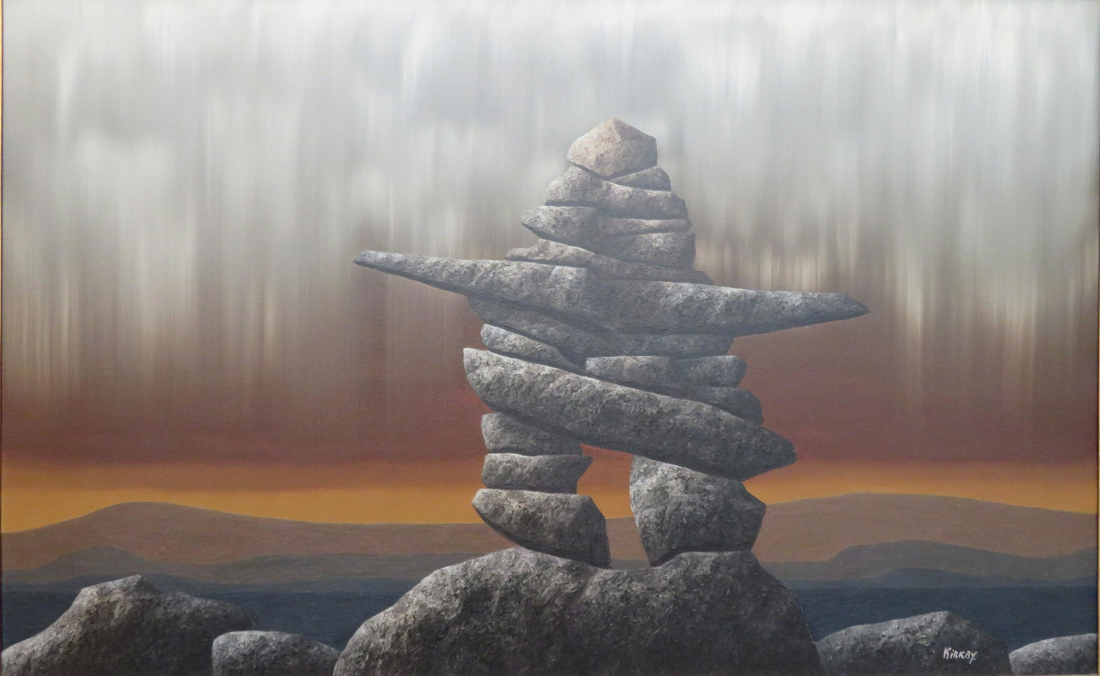Kenneth (Ken) Michael Kirkby: Oil on canvas, titled Inukshuk. Stunning example showing a large Inukshuk on a rocky landscape. Graduating earthtones to the sky & hilly landscape create a dramatic overall image. Signed l/r. Image si