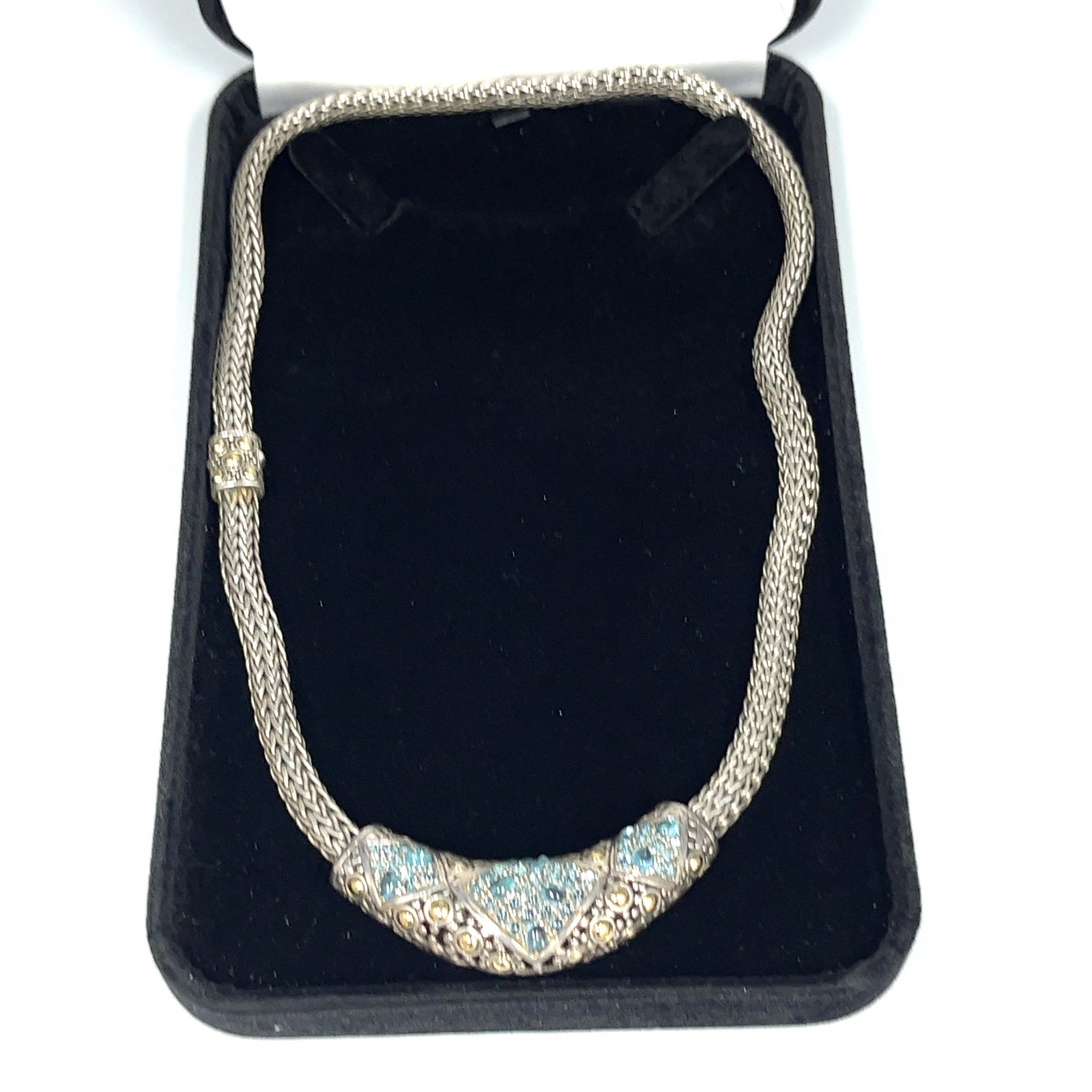 John Hardy Sterling Silver and Stones Slider Necklace: From designer John Hardy who is known for using recycled materials in his pieces comes this recycled sterling silver slider necklace. Hanging on a thick silver chain with a hidden clasp, the slider is