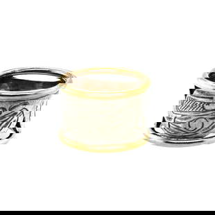Gold & Silver Aboriginal Art Ring: This is a unique sterling silver band ringed with yellow gold and etched with aboriginal carvings. This ring is a size 7 and total weight is 8 grams. The ring shows some patina from age as can be seen