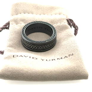 David Yurman Black Titanium Streamline 3 row diamond band: From designer David Yurman comes this black titanium Streamline 3 row diamond Band. This ring has three rows of black diamonds and is a size 10.5. Total weight of this item is 4 grams.