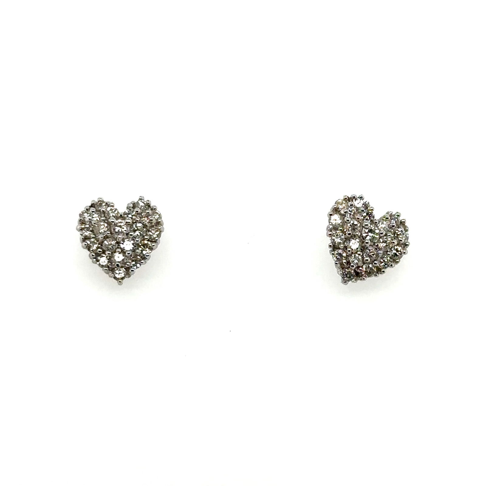 White Gold & Diamond Heart Shaped Studs: These delicate heart shaped studs are a perfect addition to any jewellery collection. Set in white gold and encrusted with sparkling white diamods. These are for pierced ears. Total weight is 2.70 gra