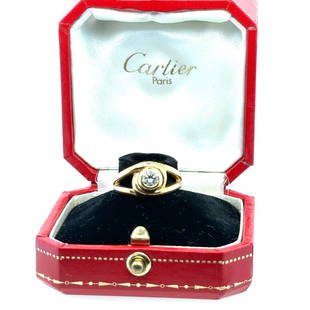 Cartier 18k gold & Diamond Ring: Cartier Certified # 1178278 18k yellow gold band set with a central diamond. Total weight is 7.8 grams and is a size 5.5.