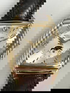 Patek Philippe Gondolo Calendrio Mens Watch: Patek Philippe 5135 Gondolo Calendario 18k Yellow Gold Watch with papers. 18k yellow gold case and bezel. Silver coloured dial with gold coloured hands and numeral markers. Automatic movement. Case si