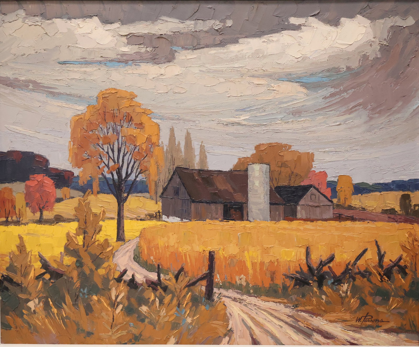 William Parsons, Canadian (1909-1982): Oil on board showing a country path leading to barns, titled: ‘’Autumn Gold’’. Signed l/r, titled and inscribed Ontario 1971 verso. Image size: 24’’x29’’ (Frame size: 30’’x35’’