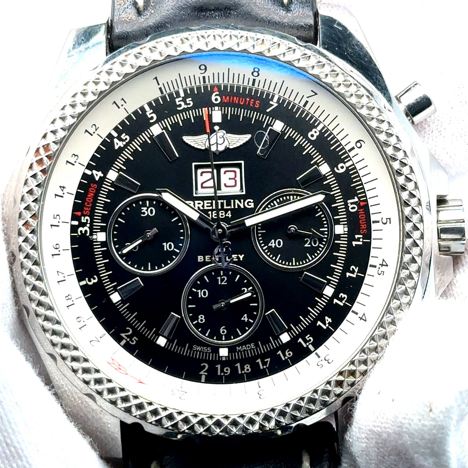 Breitling Bentley: Breitling Bentley Men's Watch. Stainless steel case and bezel. Blue dial with silver-tone luminescent hands and index hours markers. Date aperture between the 4 and 5 o'clock position and chronograph