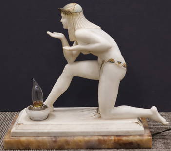 Eugenio Battiglia, Italian (19th/20th Century: Hand carved alabaster figural lamp depicting a neoclassical kneeling figure posing with outstretched hands. The whole bears gilt highlights to her headdress and gown. Signed & marked Firenze to the ba