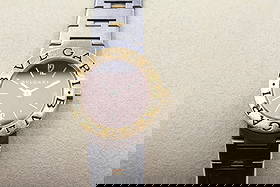 BVLGARI Two Tone Quartz Ladies Watch: Crafted for the discerning woman, the BVLGARI Two Tone Quartz Ladies Watch seamlessly combines elegance and precision. The watch features a sophisticated black dial complemented by the luxurious touch