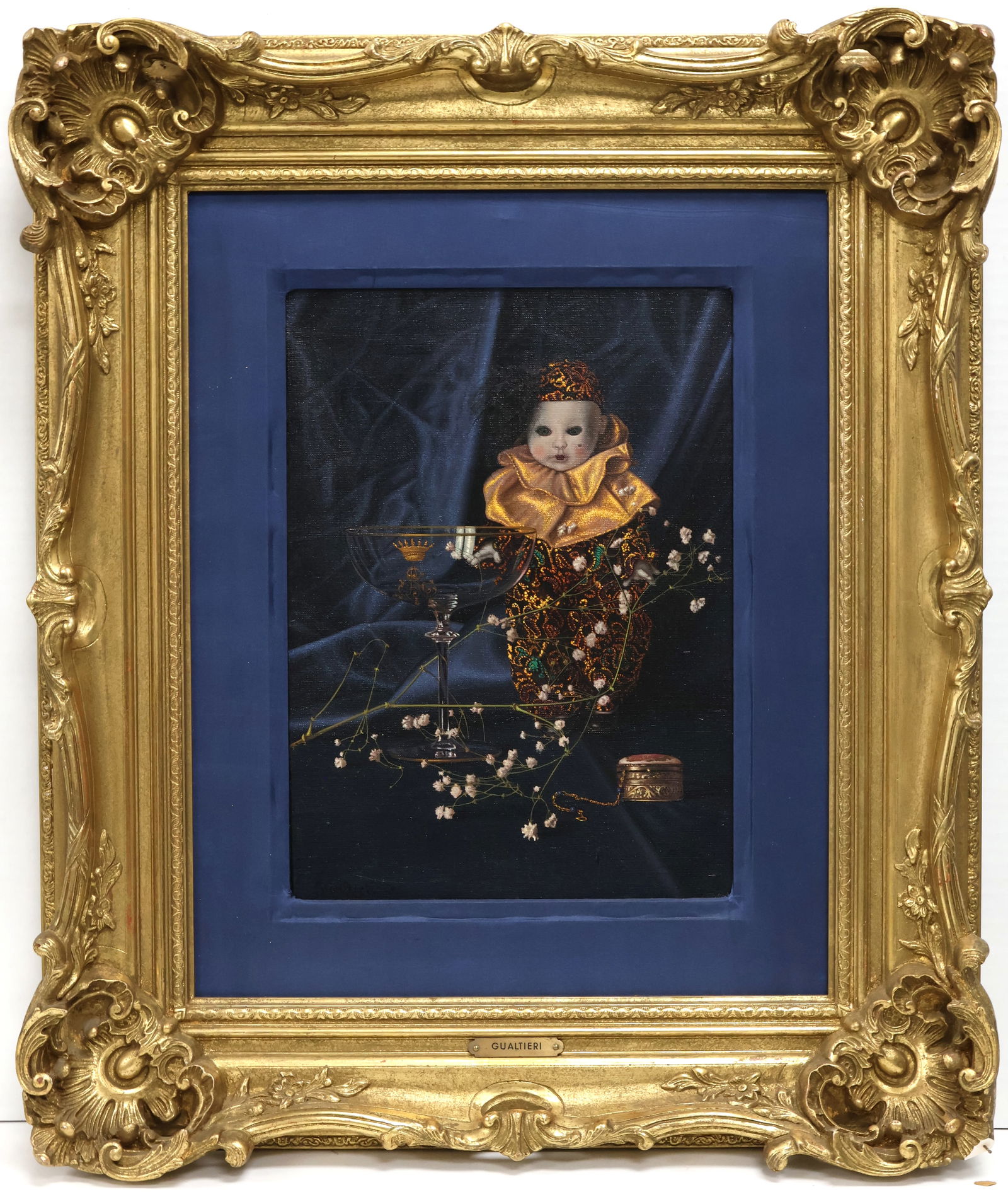 Gianrico Gualtiere, French (b. 1962): Oil on canvas showing a symbolistic still life study with harlequin doll by a glass chalice and trinket box. Signed l/l, Image size: 13”x10” (Frame size: 24”x20”).
