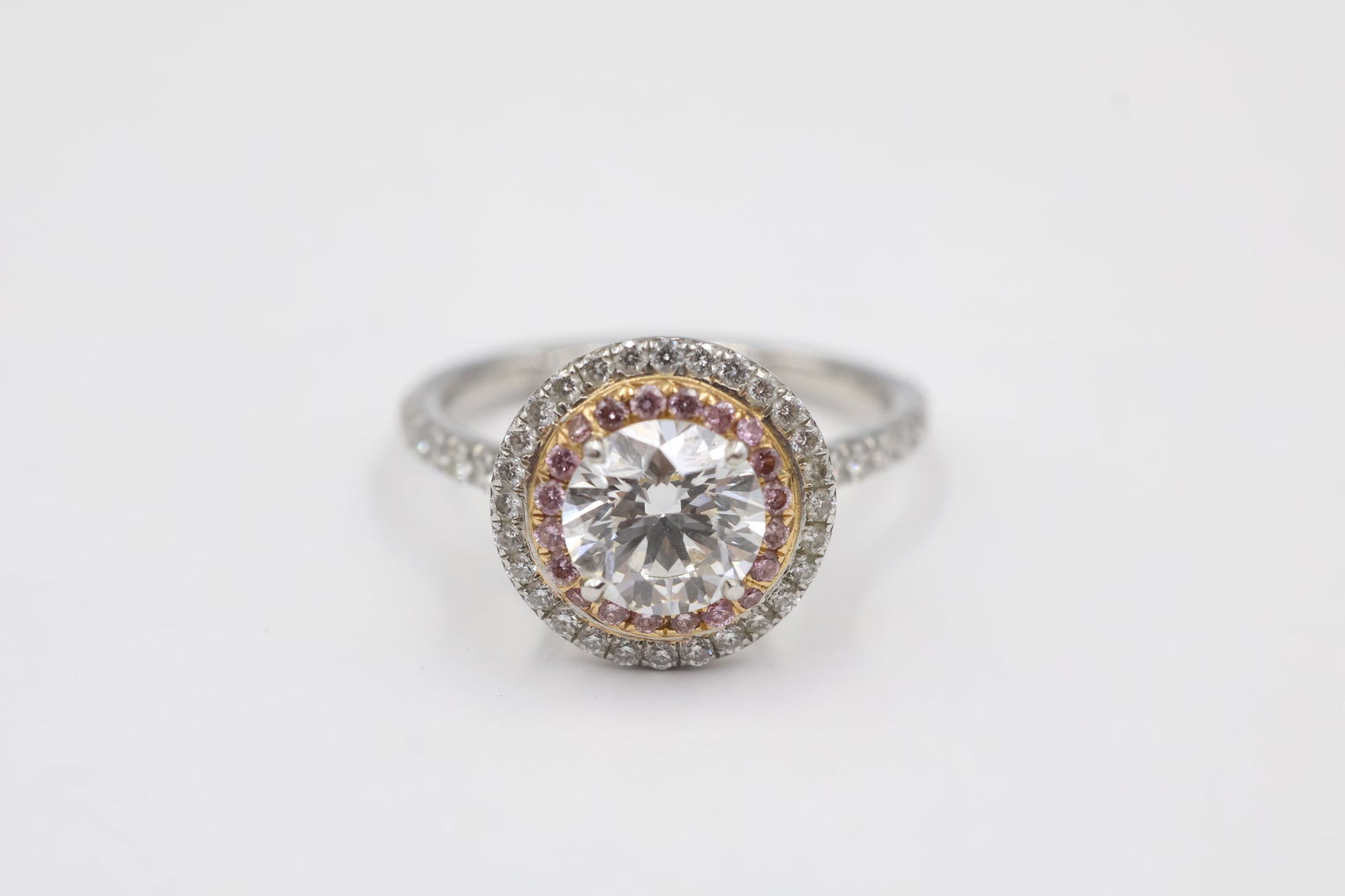 Tiffany Soleste Pt & 18k Rose Gold Ring 1.08ct: Tiffany & Co. Soleste double-row ring in platinum and 18k rose gold. Centre: 1.08ct round brilliant, G colour, VS1 clarity. Inner row: fancy pink round brilliants, approx. 0.08ct. Outer rows and