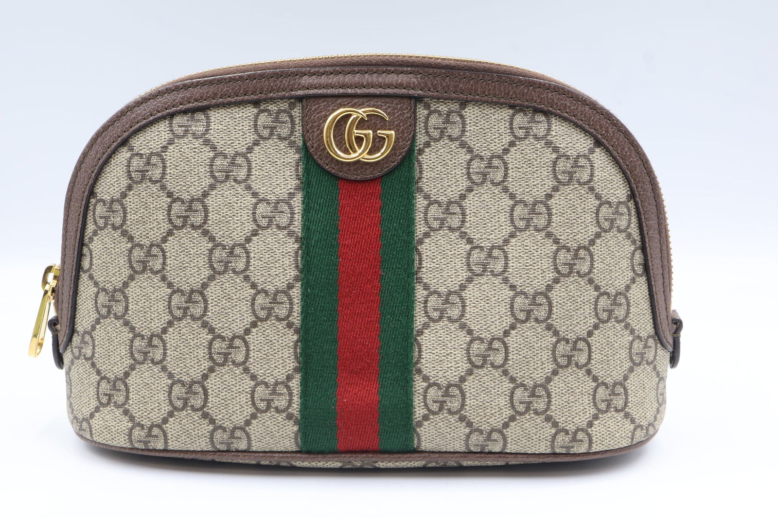 Gucci Ophidia GG Cosmetic Case Like New — Box & Receipt: Gucci Ophidia cosmetic case in GG monogram coated canvas. Web stripe detail. Light gold-toned hardware. Green cotton interior. Presented with original box, dust bag, and original purchase receipt.