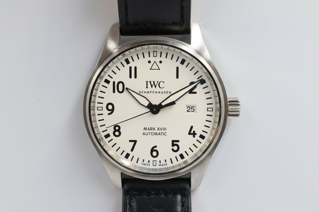 IWC Mark XVIII Pilot's Watch — Reference IW327001: IWC Mark XVIII pilot's watch in stainless steel. Black leather strap (up to 8-inch wrist). Presented with original box and booklets. Case size: 41 mm