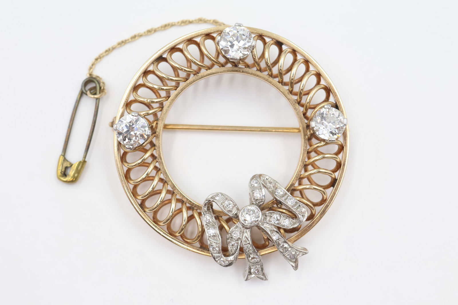 Vintage 14k Gold OEC Diamond Brooch 2.20ctw: Vintage brooch in 14k gold set with old European cut diamonds totalling 2.20 carats. Total weight: 16.2g. Stamped 14k.