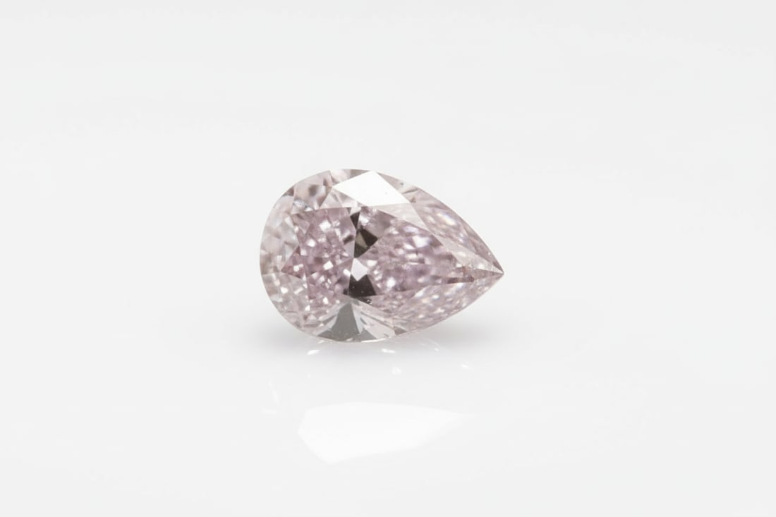 GIA 0.14ct Fancy Purplish Pink Diamond: Loose natural diamond. GIA report #2175452248. 0.14 carats. Fancy Purplish Pink. Pear modified brilliant. Dimensions: 3.86 × 2.80 × 1.70mm.