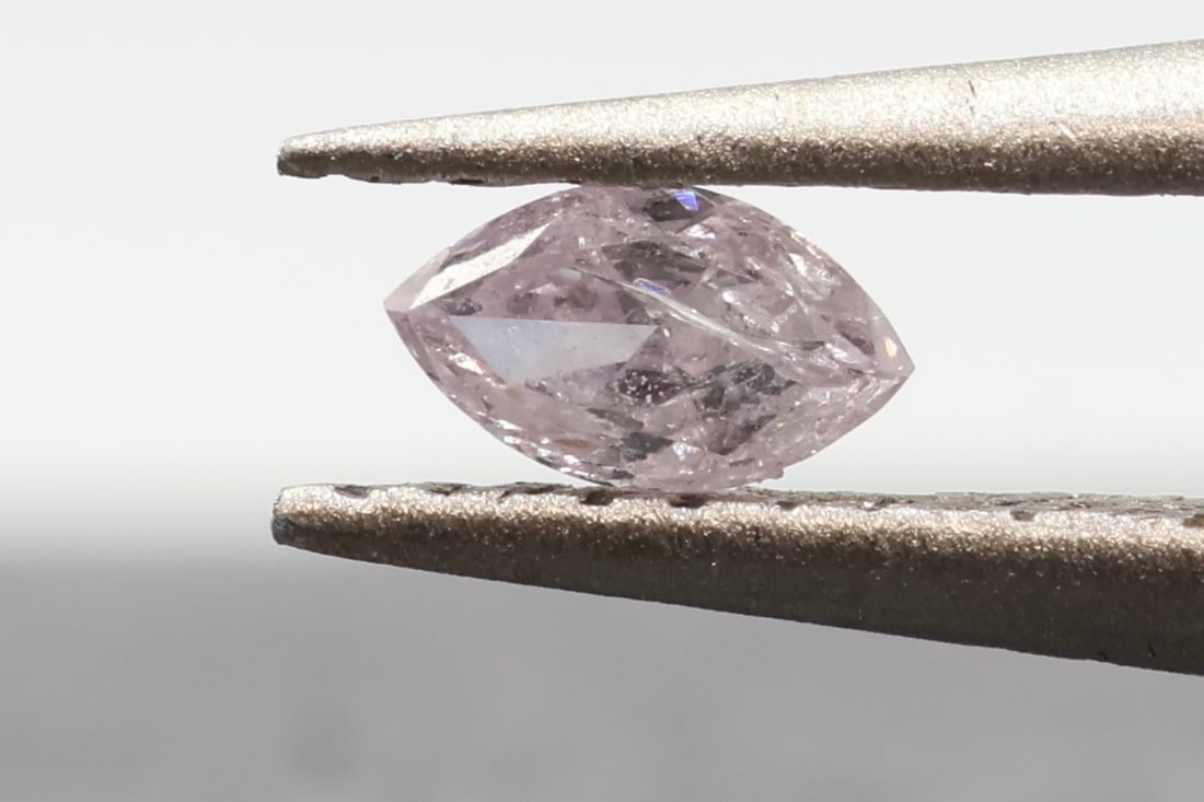 GIA 0.09ct Fancy Lt. Purplish Pink Diamond: Loose natural diamond. GIA report #5171518372. 0.09 carats. Fancy Light Purplish Pink. Marquise modified brilliant. Dimensions: 4.03 × 2.34 × 1.44mm.