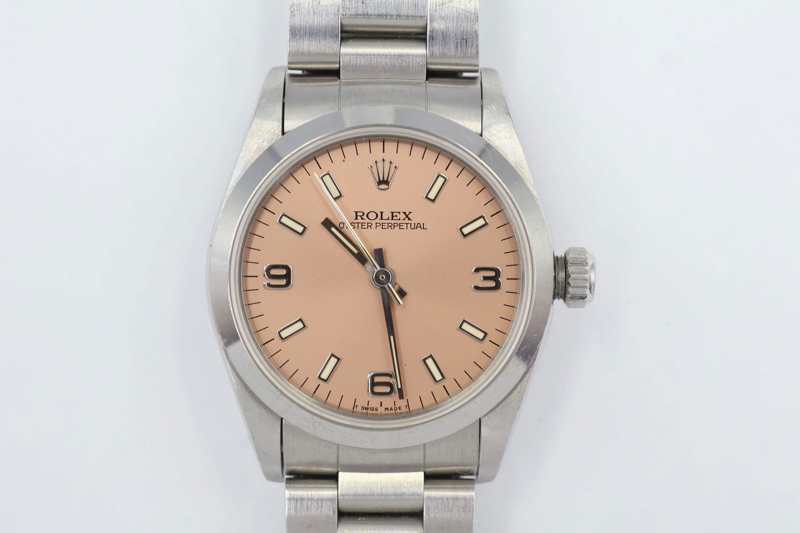 1991 Rolex Oyster Perpetual Ladies — Ref 67480: Rolex Oyster Perpetual ladies' watch, reference 67480, circa 1991. Salmon dial. 31mm case. Automatic movement. Presented with additional bracelet links and original box.