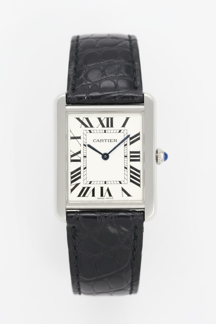 Cartier Tank Steel — Ref 2715, Box & Booklets: Cartier Tank, reference 2715, in stainless steel. Quartz movement. Personal engraving on caseback. Presented with original box and booklets.
