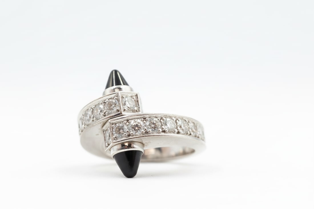 Cartier 18k White Gold Diamond Sapphire Ring: Cartier ring in 18k white gold set with white diamonds and blue sapphires. Ring size 51 (EU, approx. US 6). Total weight: 9.8g. Stamped Cartier, 750.