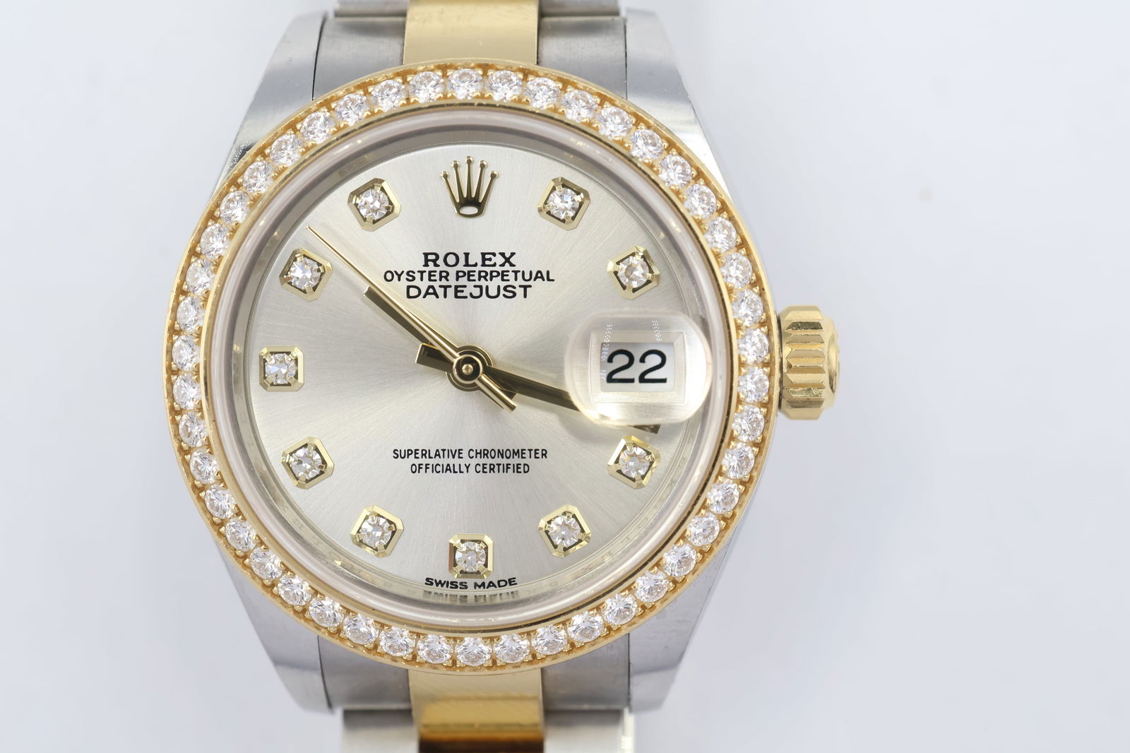 Rolex Ladies Datejust 28mm — Ref 279383: Rolex Datejust ladies' watch, reference 279383, in two-tone stainless steel and 18k yellow gold. Silver dial with diamond hour markers. Presented with 2 additional bracelet links.