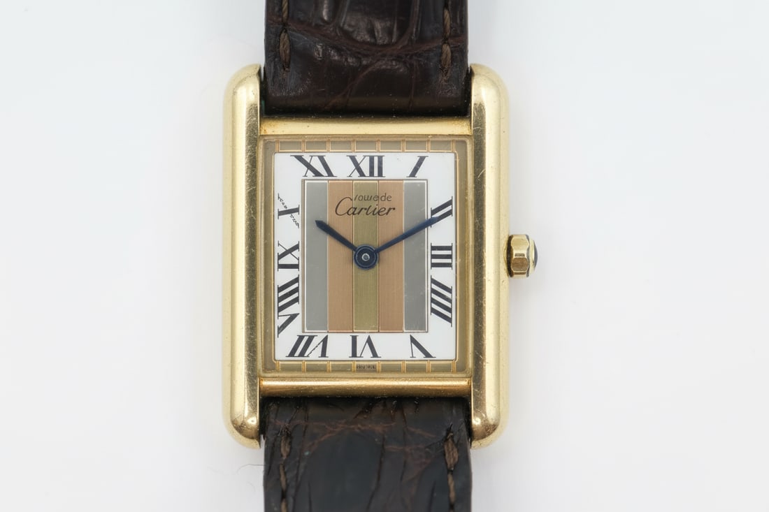 Cartier Tank 925 Silver Quartz — Ref 60397: Cartier Tank, reference 60397, in gold-plated 925 sterling silver. 21mm case. Tri-colour dial. Quartz movement. Original Cartier strap. Refer to photographs for condition.