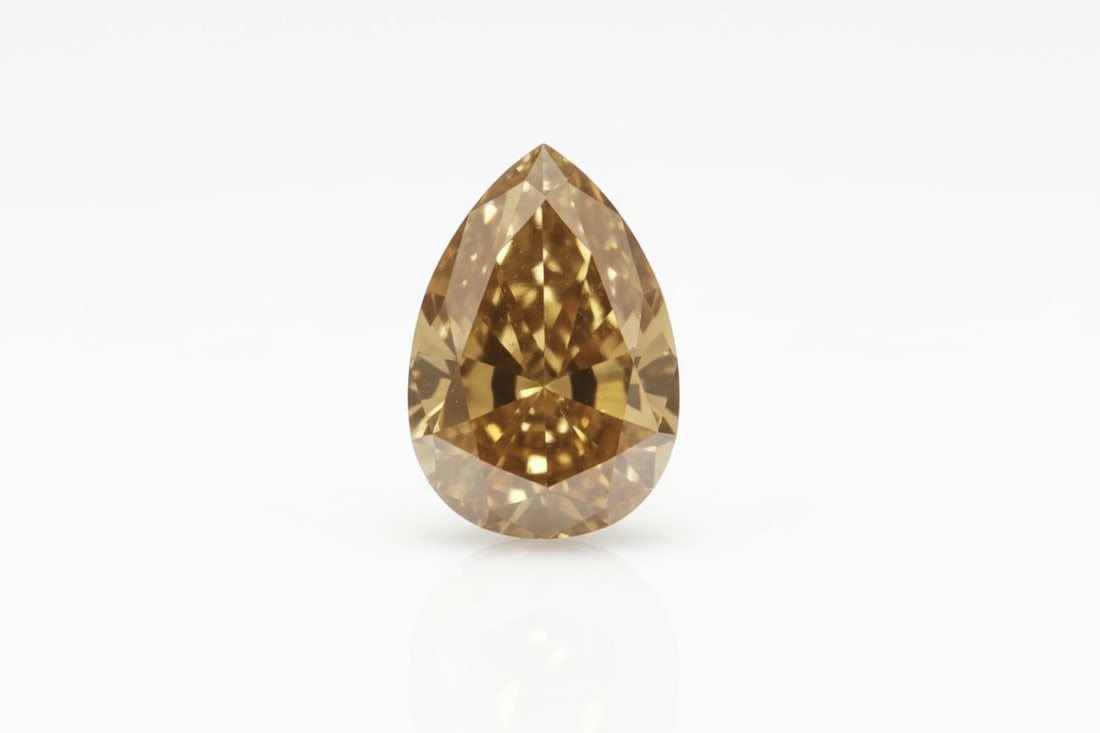 GIA 0.60ct Fancy Deep Brown Orange Diamond: Loose natural diamond. GIA report #5234327007. 0.60 carats. Fancy Deep Brown Orange. Pear modified brilliant. Dimensions: 6.38 × 4.40 × 2.95mm.