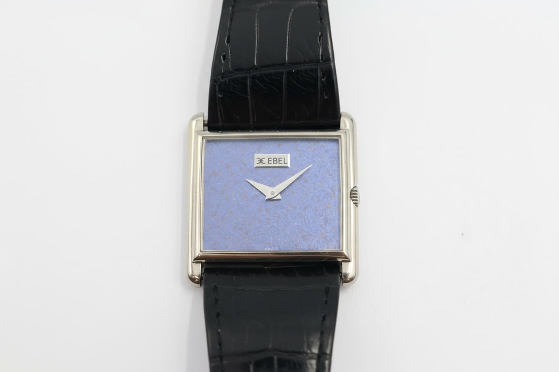 Ebel Watch — Blue Dial, Black Leather Strap: Ebel watch with speckled blue dial and black leather strap. Stamped Ebel.