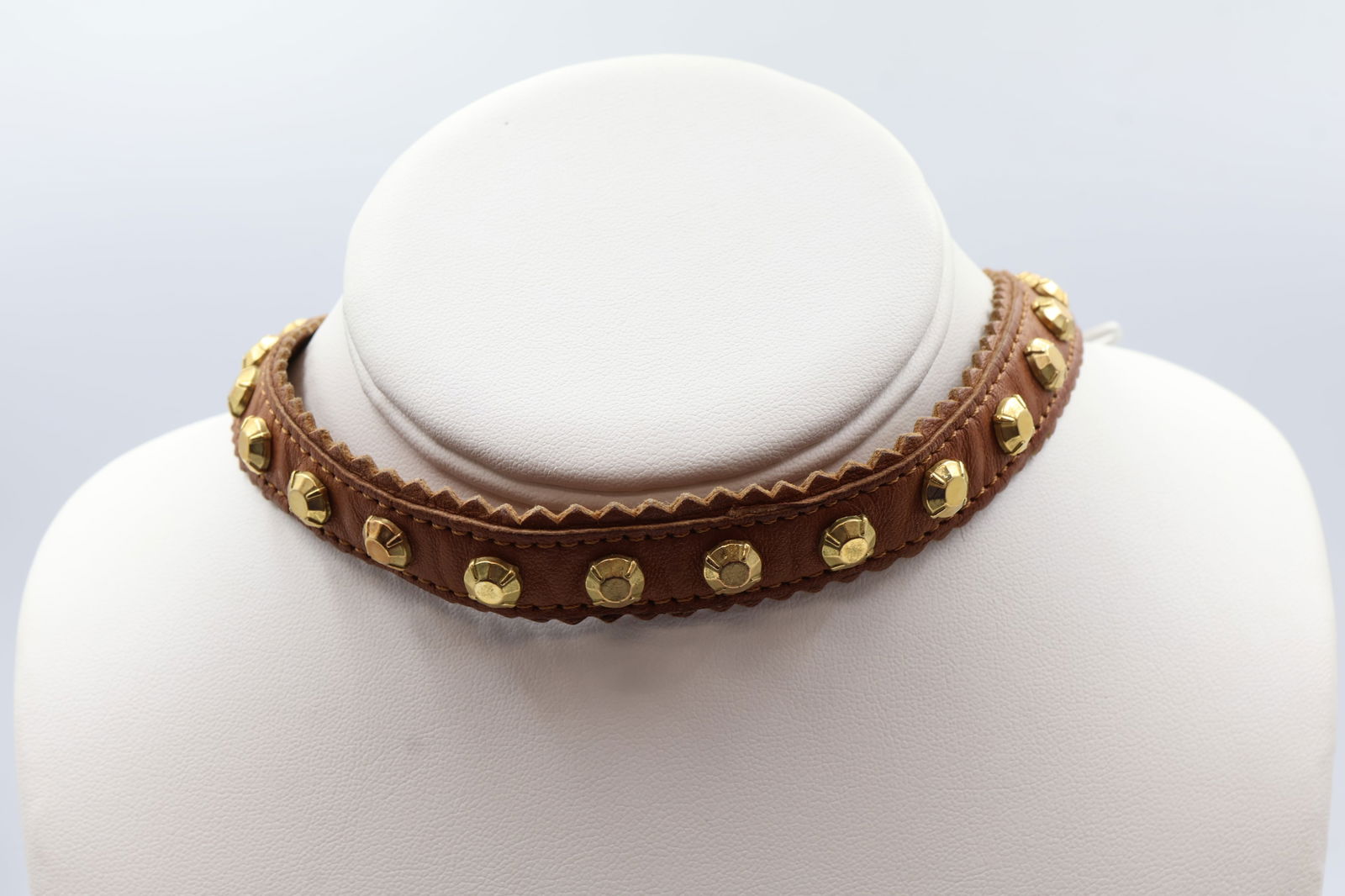 Dior Brown Leather Studded Adjustable Choker: Dior adjustable choker in brown leather with gold-tone studs. Signed Dior.