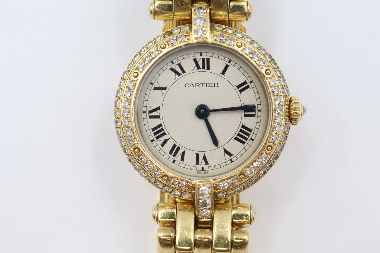 Cartier 18k Gold Watch — Diamond Bezel AS-IS: Cartier quartz watch in 18k gold with diamond-set bezel. Note: one diamond missing from bezel — can be professionally restored. Stamped Cartier, 750.