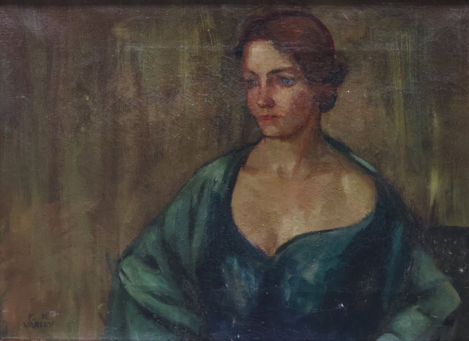 Frederick Horsman Varley Canadian (1881-1969): Oil on canvas showing a portrait study of a young woman in green dress. Inscribed verso, Emie in her early 20’s. Additional illegible inscriptions to the frame. Provenance: From the estate of Theres