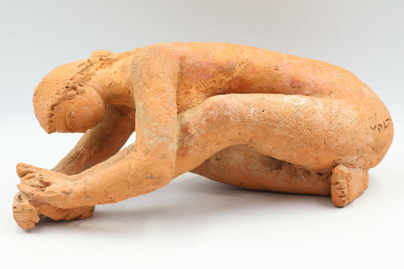 Antoniucci Volti French (1915-1989): A terracotta figural study showing a stretching woman titled Repos (rest). Signed to her left hip, dimensions: 10 x 4 x4 inches.