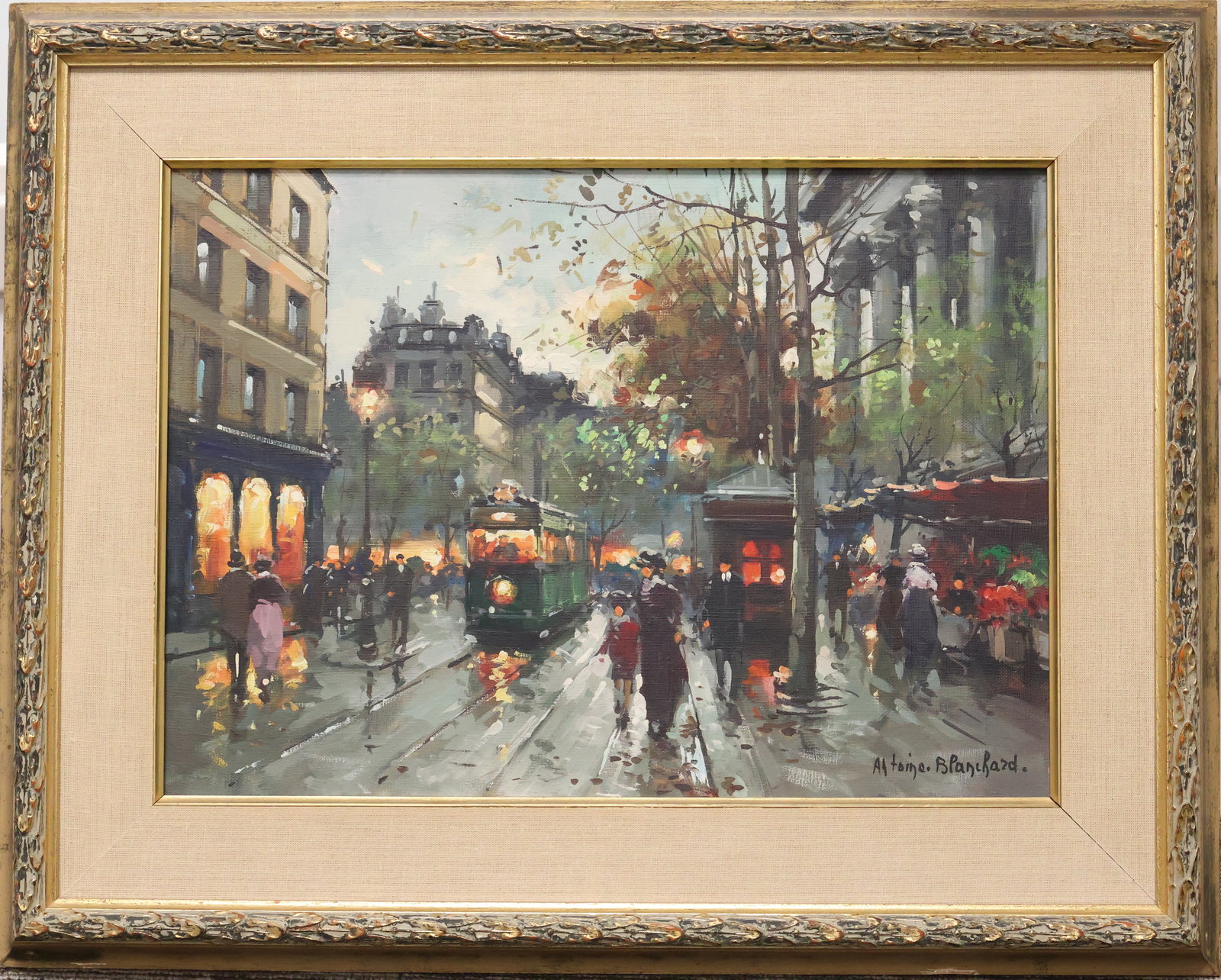 Antoine Blanchard, French (1910-1988): Oil on canvas showing a Paresian street scene at dusk. Signed l/r, Image size: 13 x18 inches (Frame size: 19.5 x 24.5 inches).