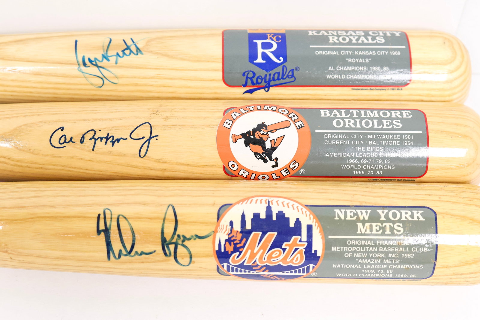 Nolan Ryan, Cal Ripken Jr., & George Brett Signed Bat Trio - Cooperstown Collection (1 of 15)