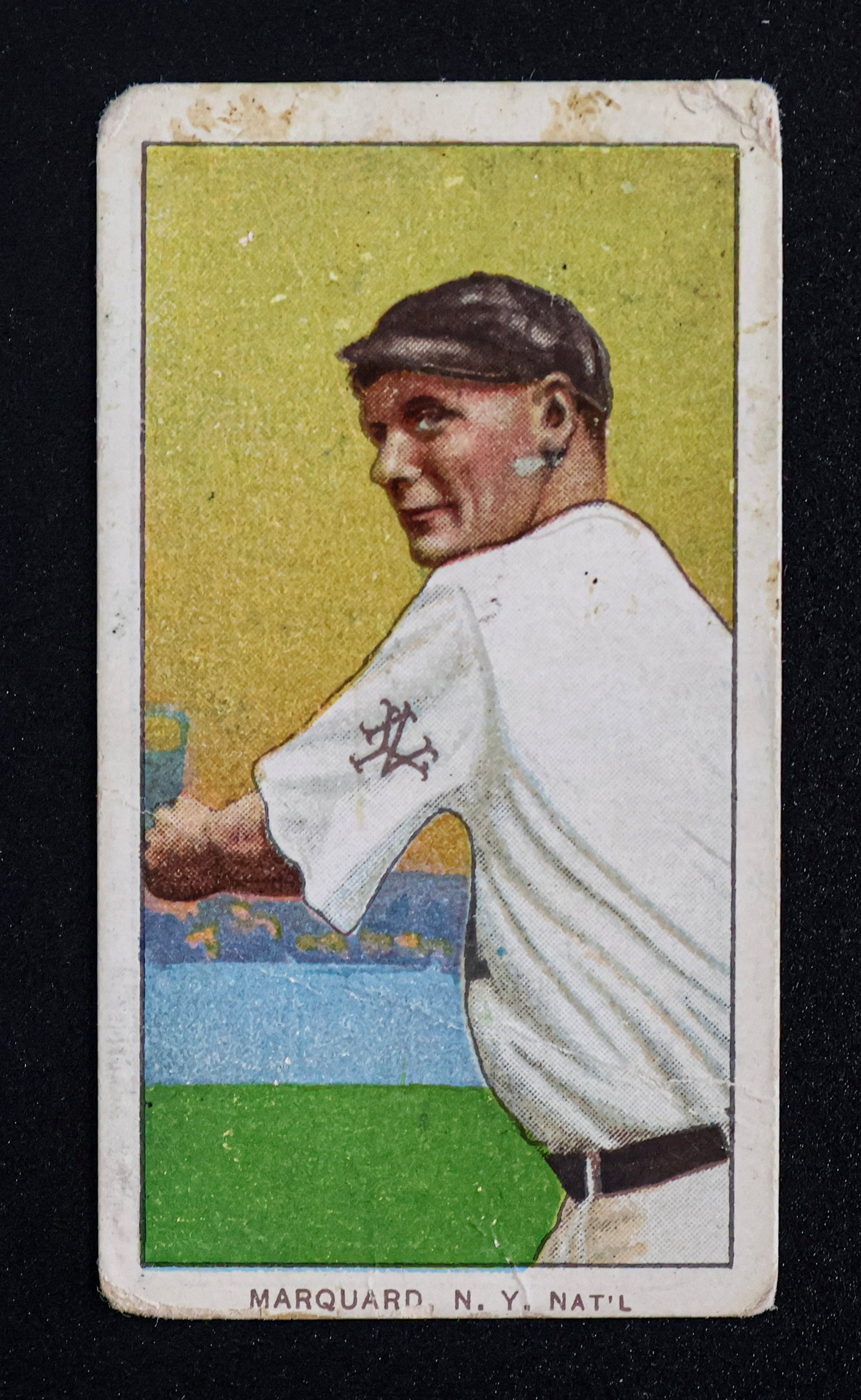 1909-1911 T206 Rube Marquard (Follow Through) - Polar Bear Back: 1909-1911 T206 Rube Marquard (Follow Through) - Polar Bear Back (E.G.D. Collection) Scarce & highly collectible T206 White Border card featuring Hall of Fame pitcher Rube Marquard in the desirable Fol