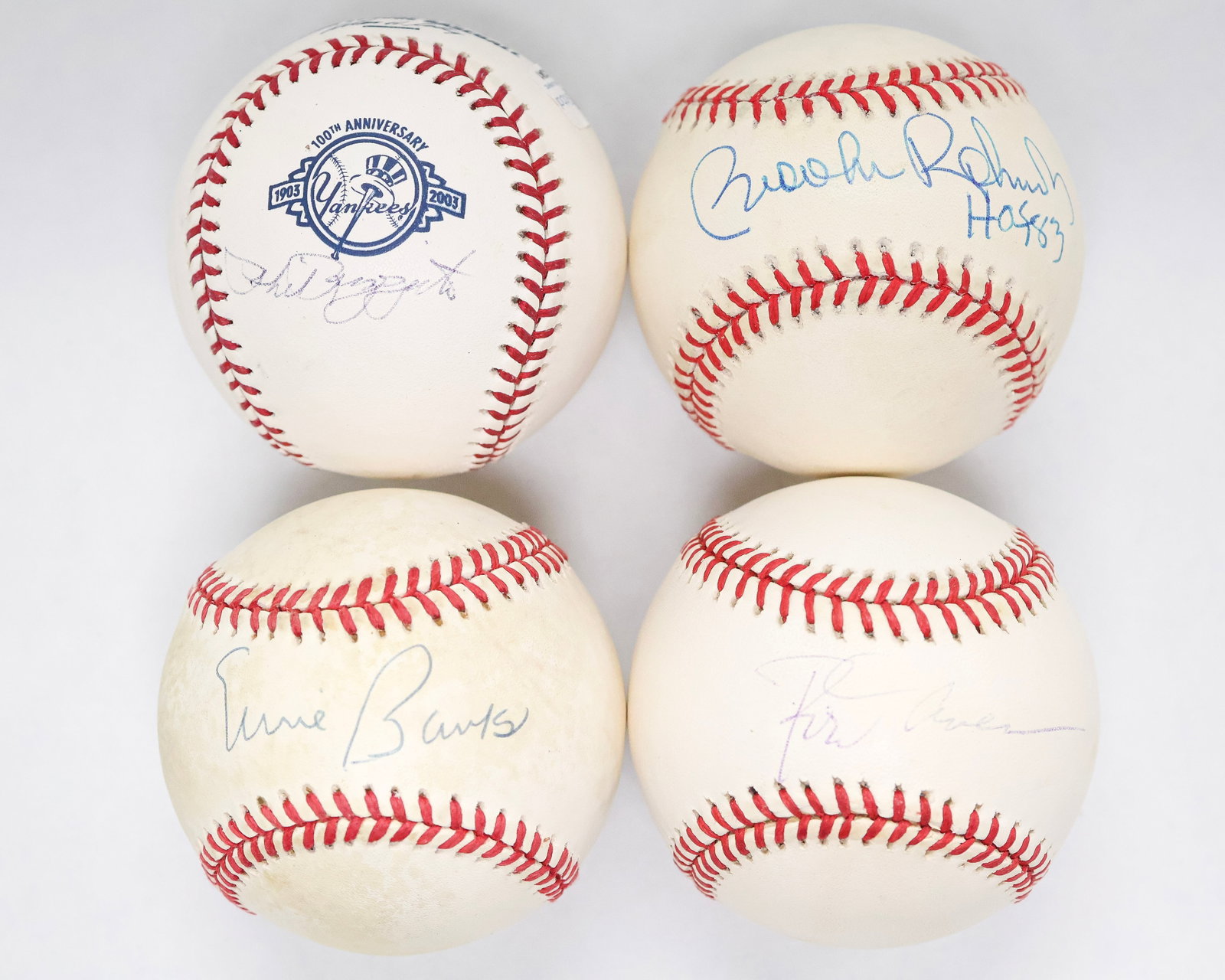Hall of Fame Infielders Signed Baseball Lot - Banks, Carew, Robinson & Rizzuto: Hall of Fame Infielders Signed Baseball Lot - Ernie Banks, Rod Carew, Brooks Robinson & Phil Rizzuto - 4 Baseballs in total Strong signed baseball quartet featuring four legendary Hall of Fame infield